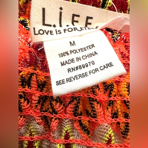 The Cutest Multi-colored Romper! - Picture 5 of 5